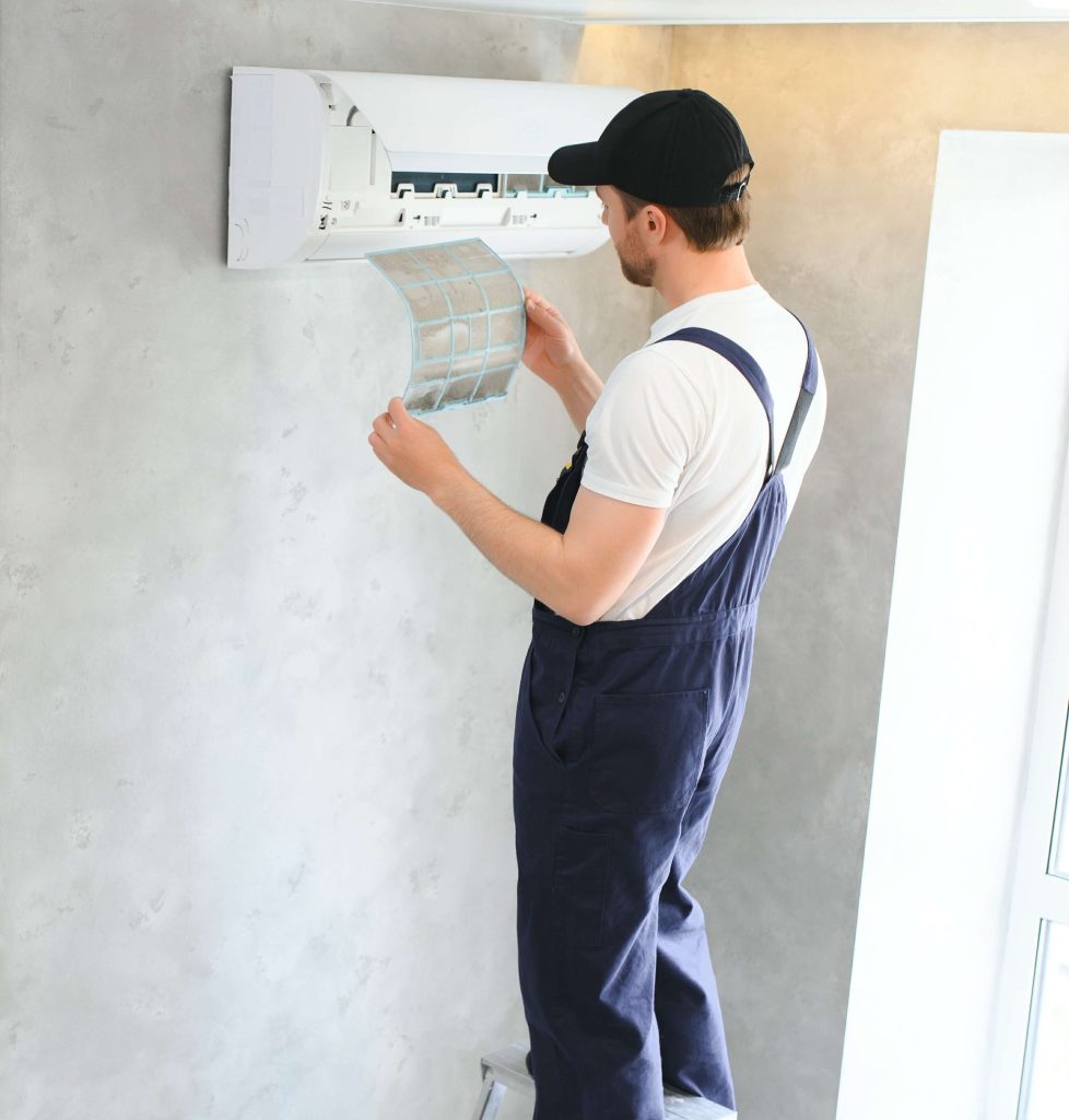 service-man-is-cleaning-repair-and-maintenance